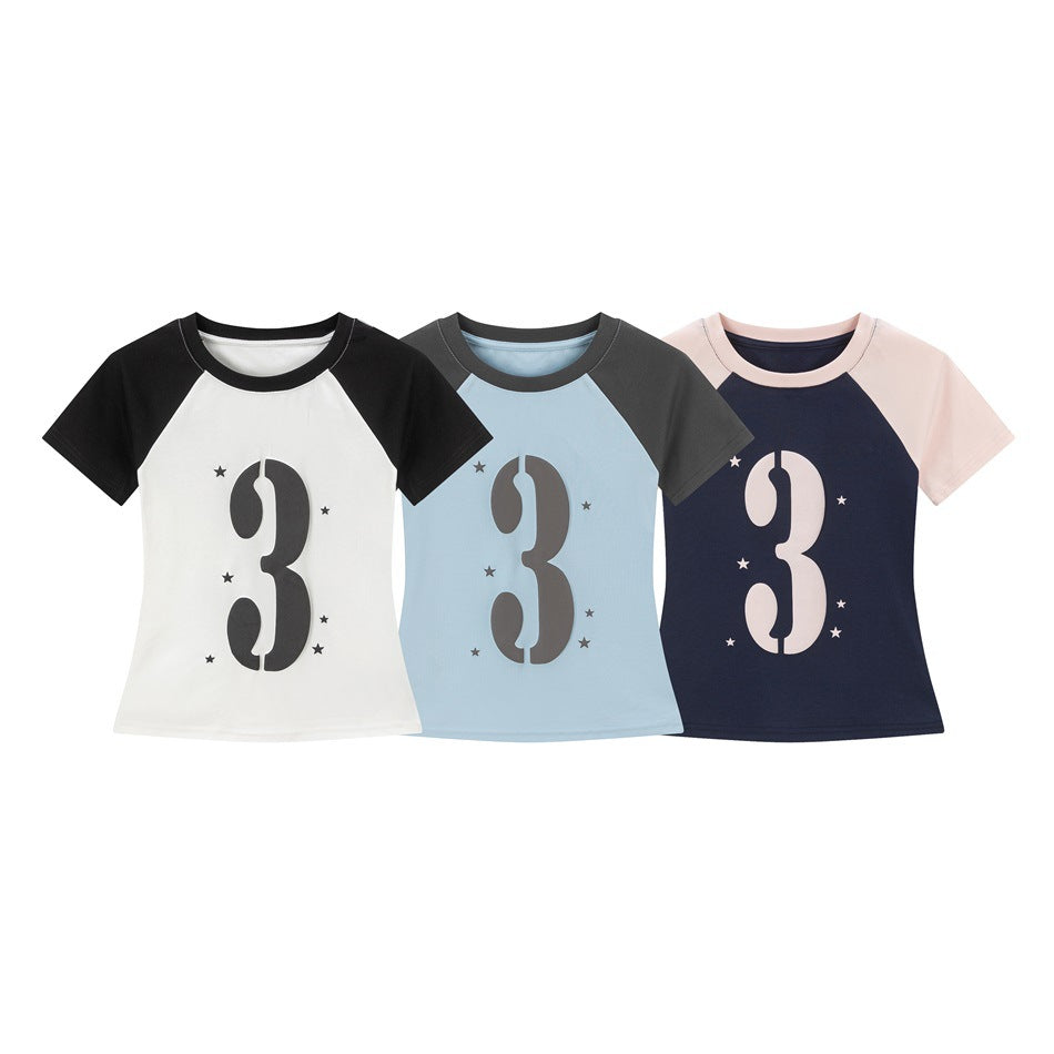 Three short-sleeve raglan T-shirts in white and black, light blue and charcoal, and navy and pale pink, each with a number 3