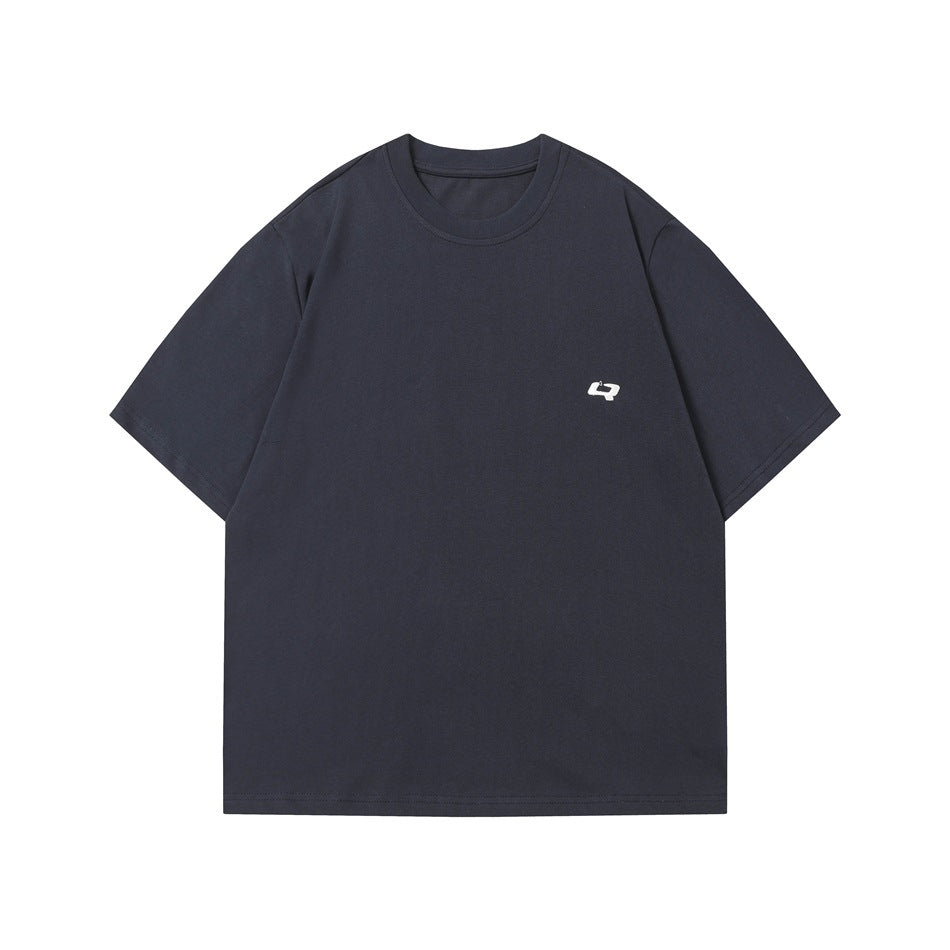 Navy short-sleeve crew neck T-shirt flat lay with small white logo mark on left chest