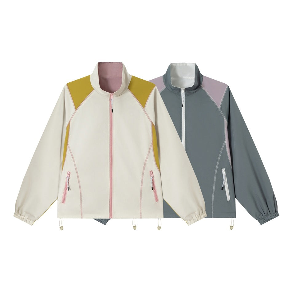 Two front-view zip jackets: ivory with olive and pink accents, and slate gray with mauve accents.
