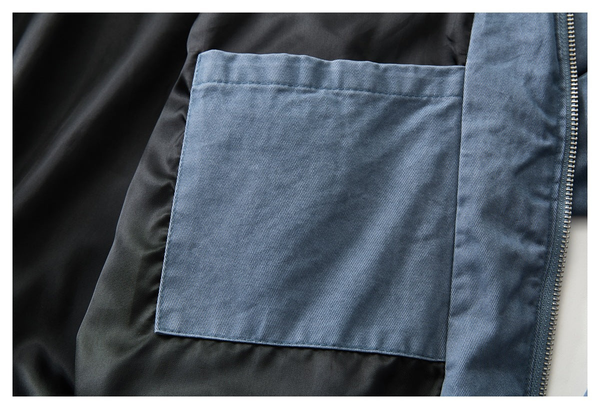 Close-up of a large blue interior pocket against black lining.
