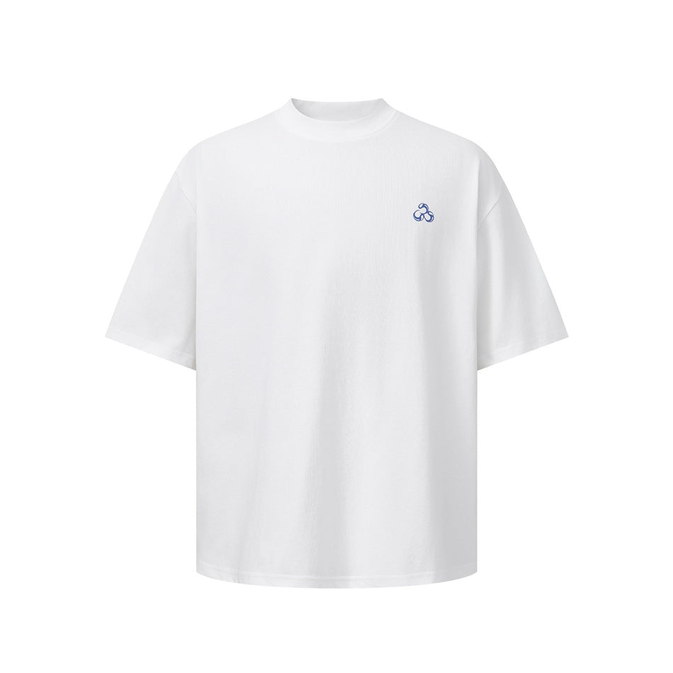 Front view of a white oversized short-sleeve T-shirt with a small blue chest emblem.