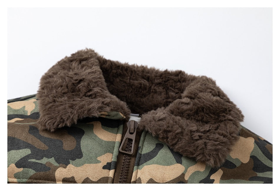Close-up of the jacket's thick dark brown fur collar and front zipper against camouflage fabric.