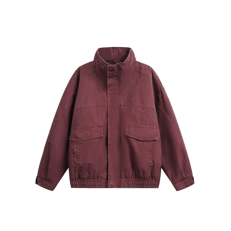 Burgundy washed-look stand-collar jacket, flat front view with flap pockets and elastic hem