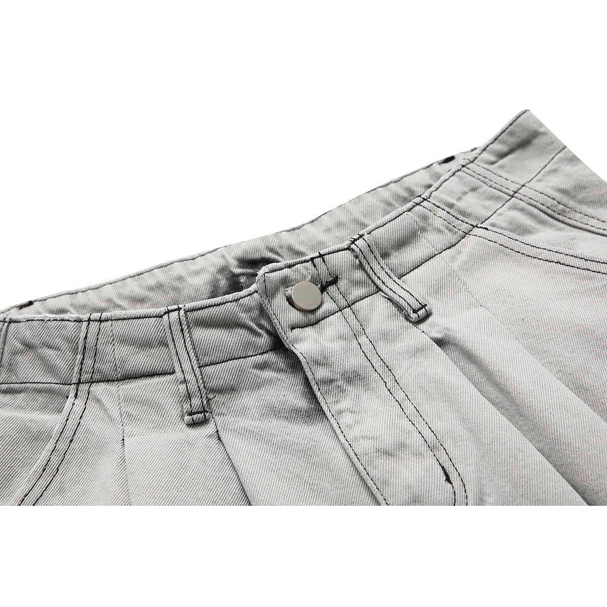 Close-up of gray washed denim shorts showing the waistband, belt loops, metal button and fly stitching.