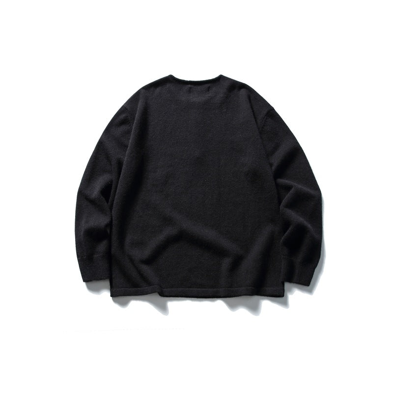 Back view of black knit pullover sweater with round neckline and long sleeves, flat lay
