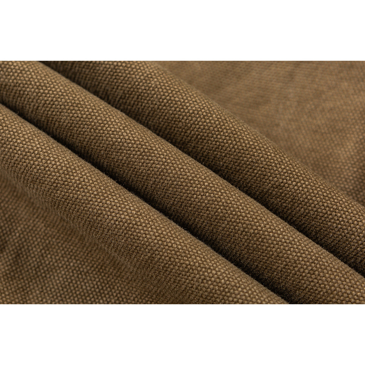 Close-up of the brown jacket’s raised, textured fabric.