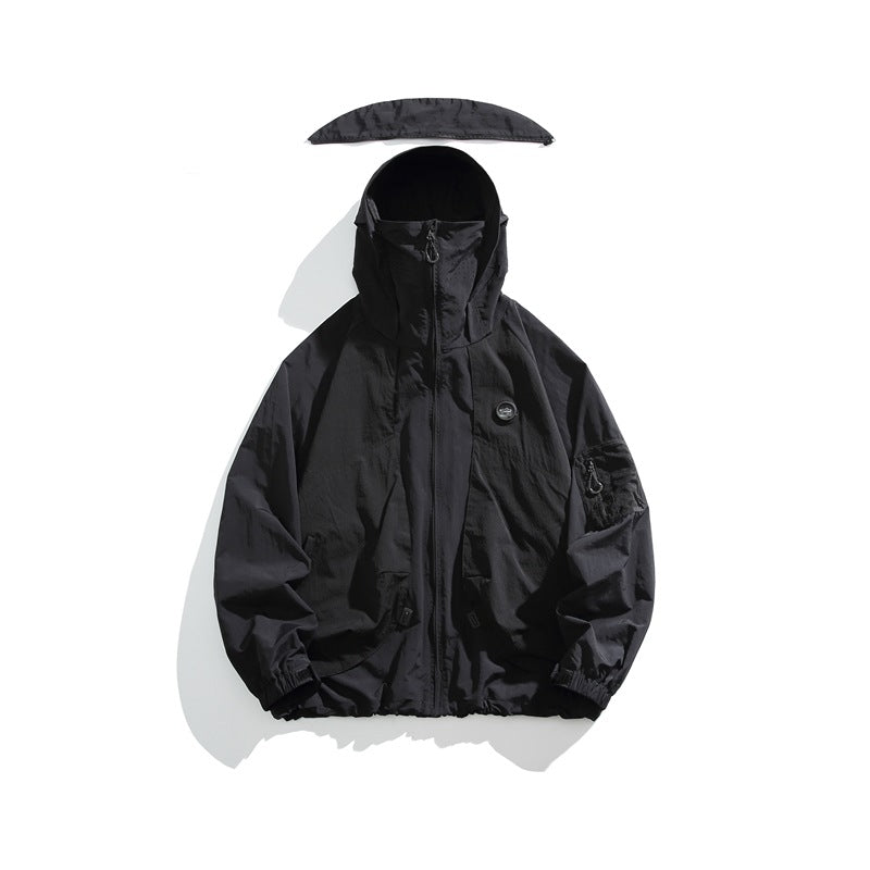 Front view of a black hooded jacket with a front zipper, elastic cuffs, and a sleeve pocket.