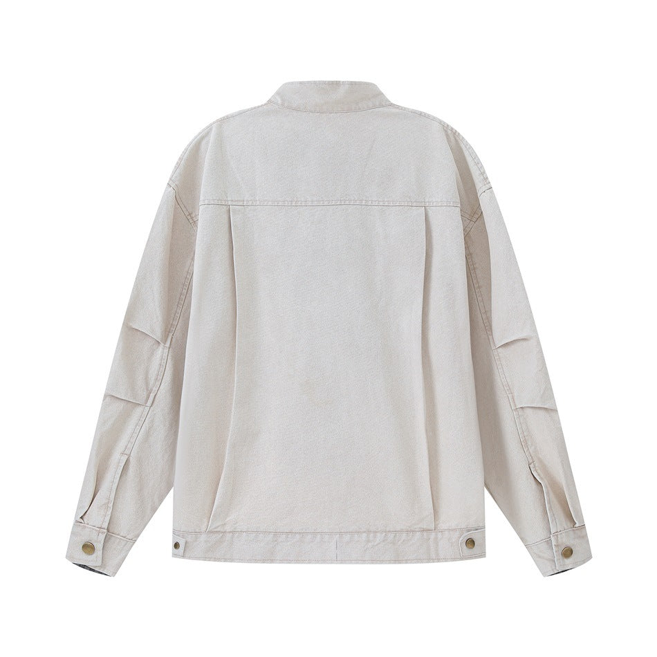 Back view of a light beige jacket with a stand collar, long sleeves, and snap details at the cuffs and hem.