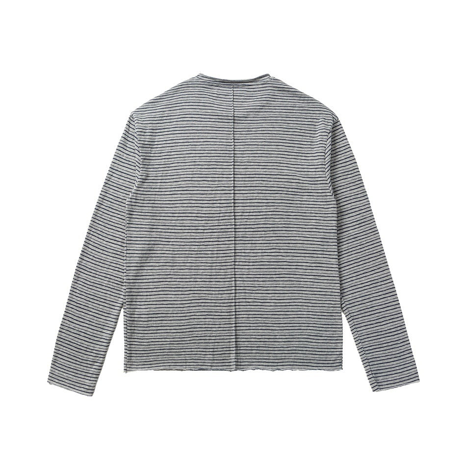 Back view of gray long-sleeve top with dark navy stripes and a center back seam, flat lay