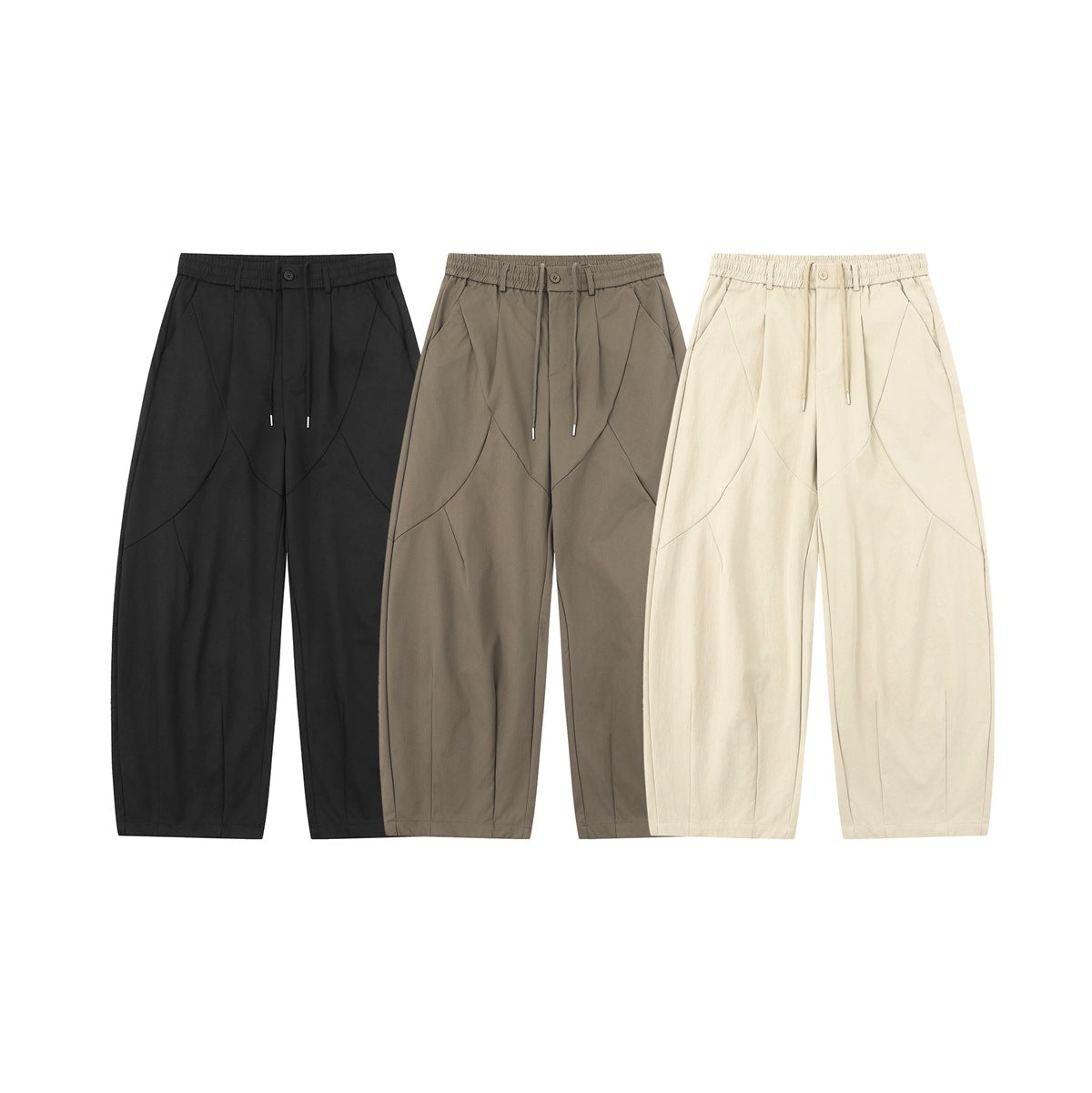 Three pairs of wide-leg trousers shown from the front in black, taupe, and cream.