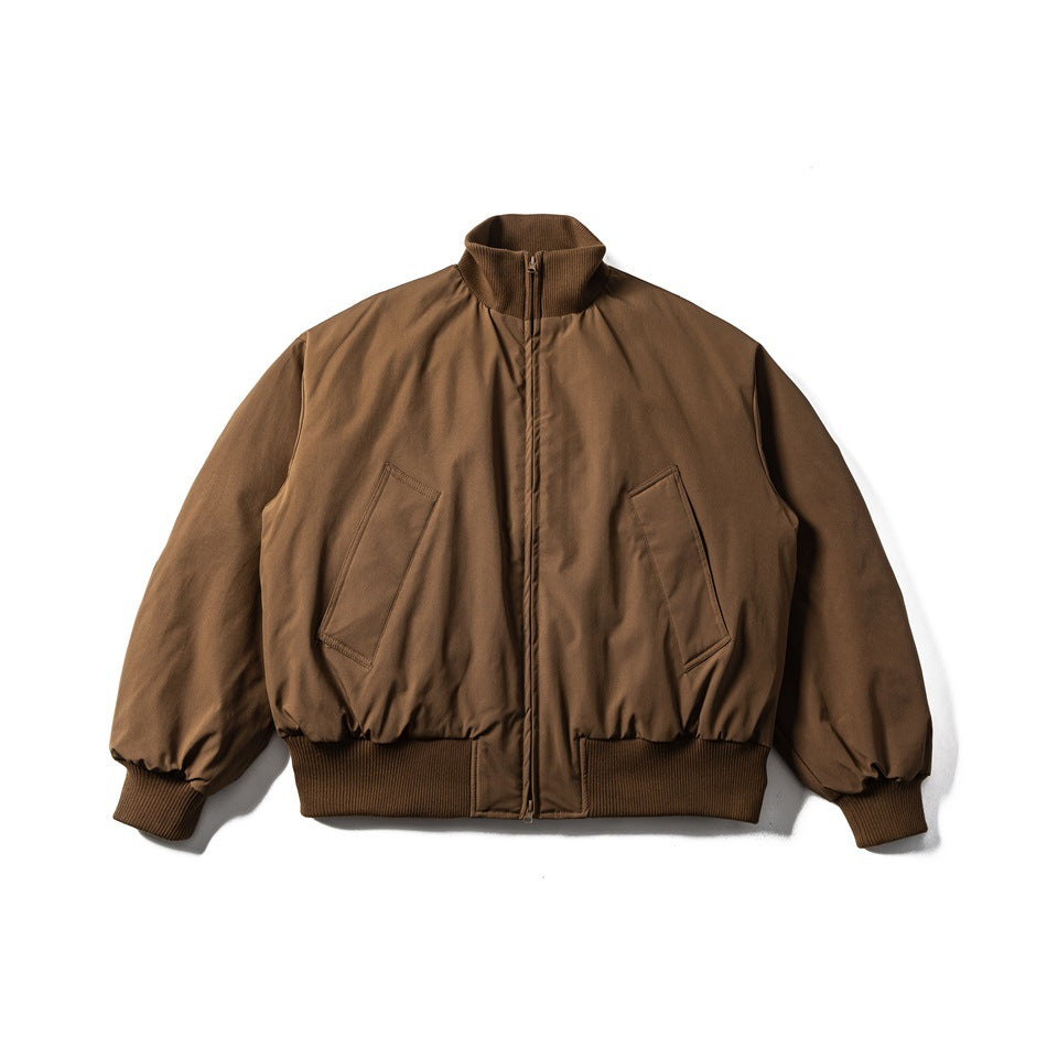 Brown bomber-style puffer jacket flat lay, front view, with ribbed stand collar, zipper, slanted pockets and ribbed cuffs