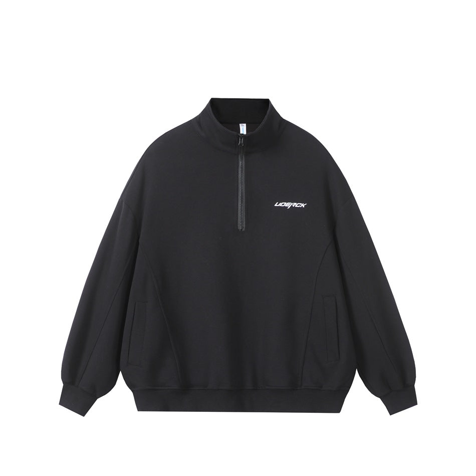Black half-zip stand-collar sweatshirt, front flat view with small white chest logo, slanted pockets and ribbed hem