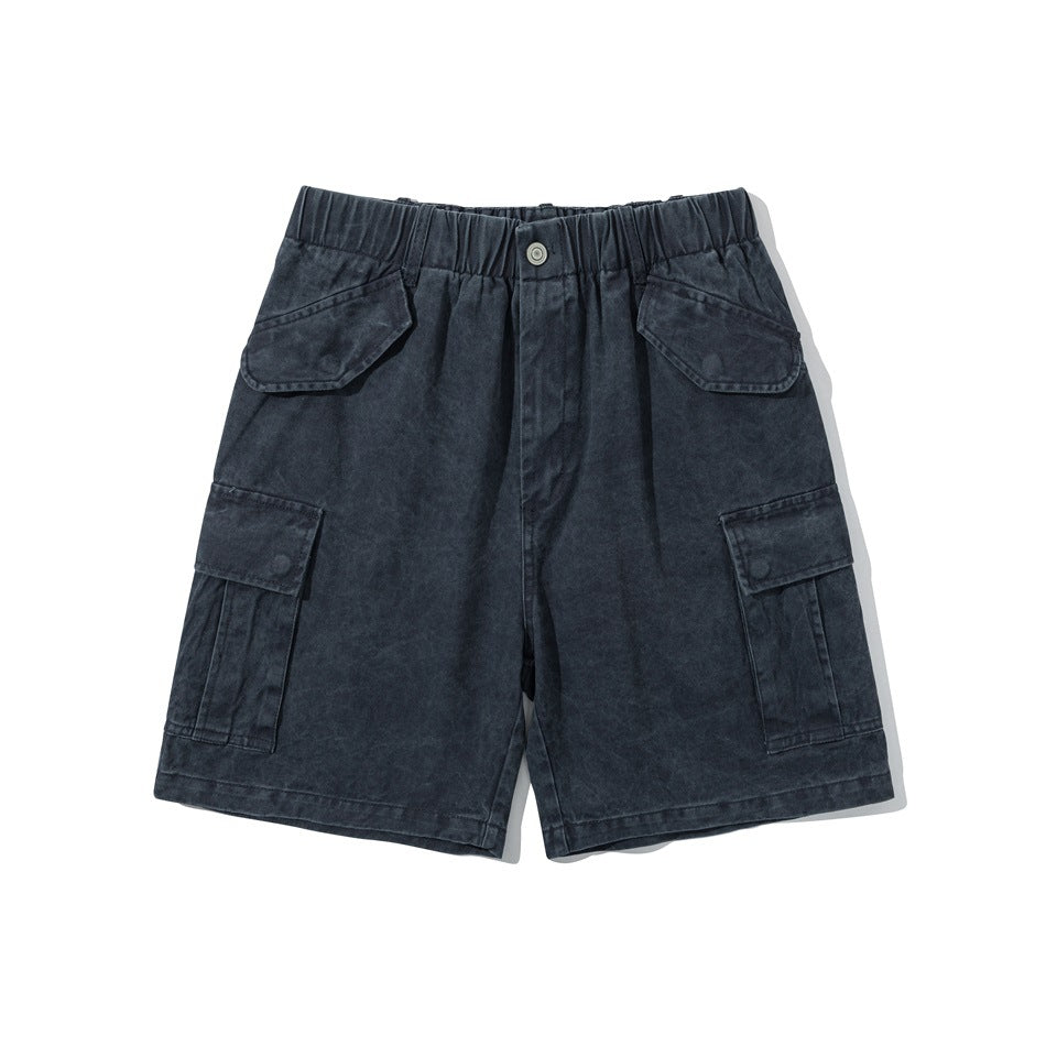 Navy washed cargo shorts flat lay front view with elastic waistband and snap-flap side pockets