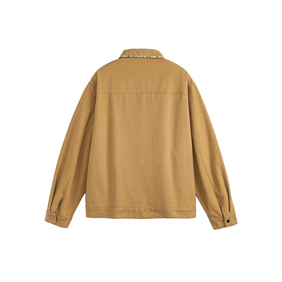 Back view of a tan long-sleeve jacket displayed flat, with a multicolor-trimmed collar and button cuffs.