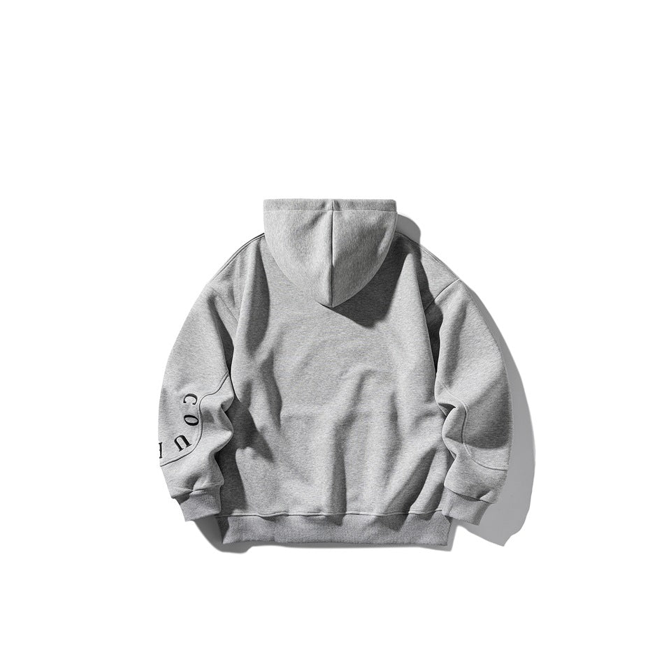 Back view of a light gray hooded sweatshirt with dark lettering on one sleeve.