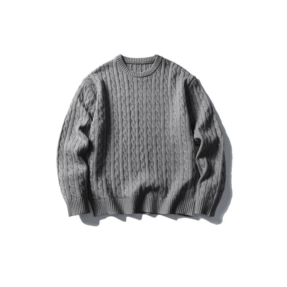 Gray cable-knit crew-neck sweater laid flat, front view