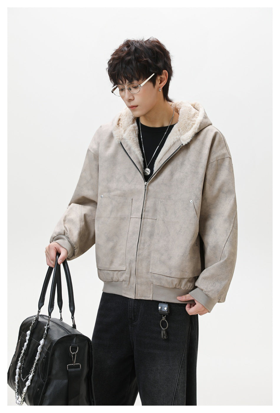 Model wearing a taupe hooded zip jacket with cream plush lining and two large front pockets.