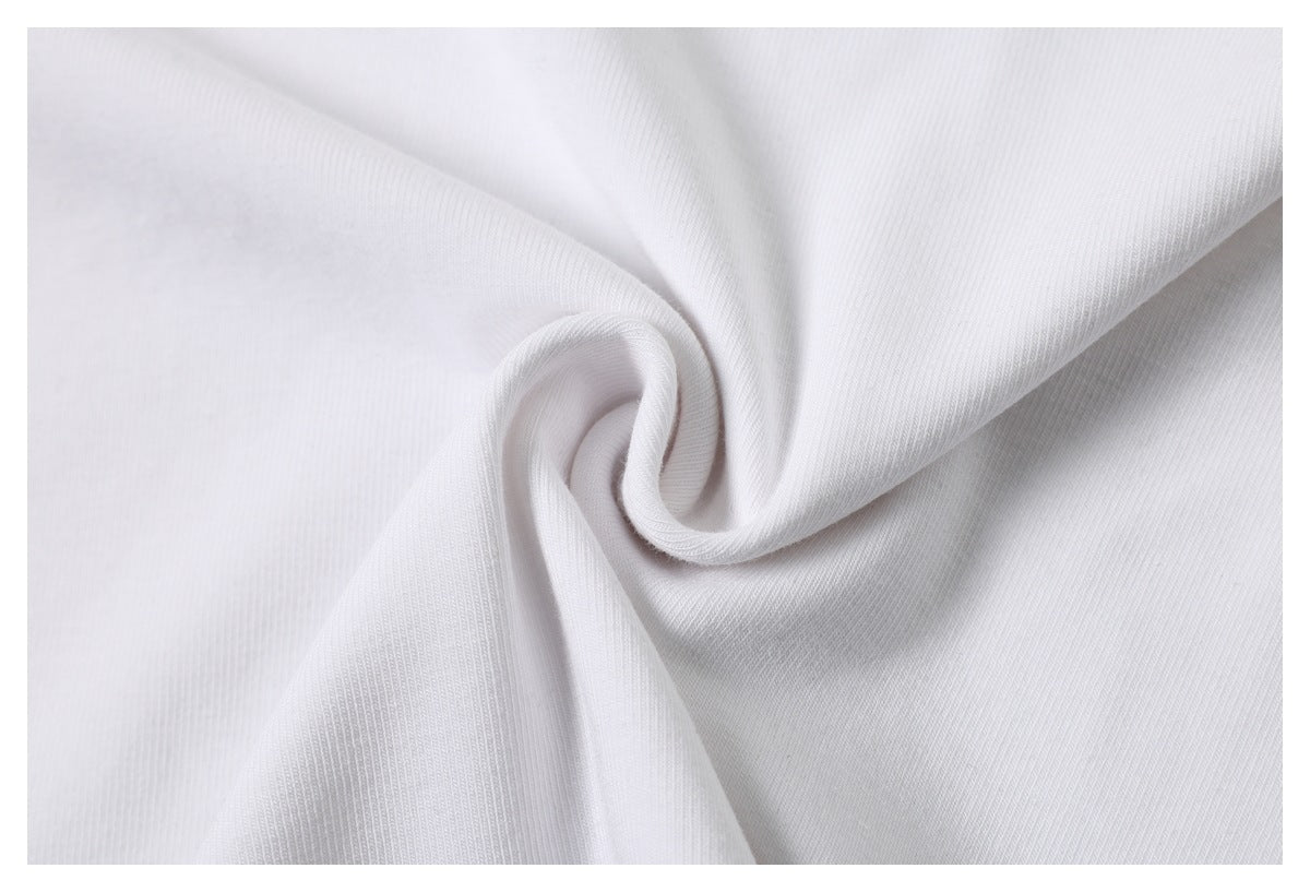 Close-up of white T-shirt fabric gathered into a spiral twist.