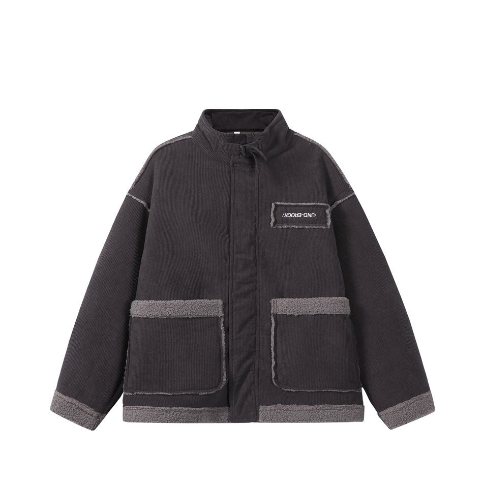 Dark gray corduroy-look stand-collar jacket with gray fleece-like trim on large pockets, cuffs and hem, flat front view