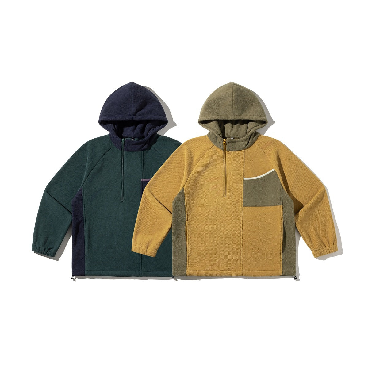 Two hooded pullover jackets shown from the front: mustard and olive, and dark teal with navy accents.