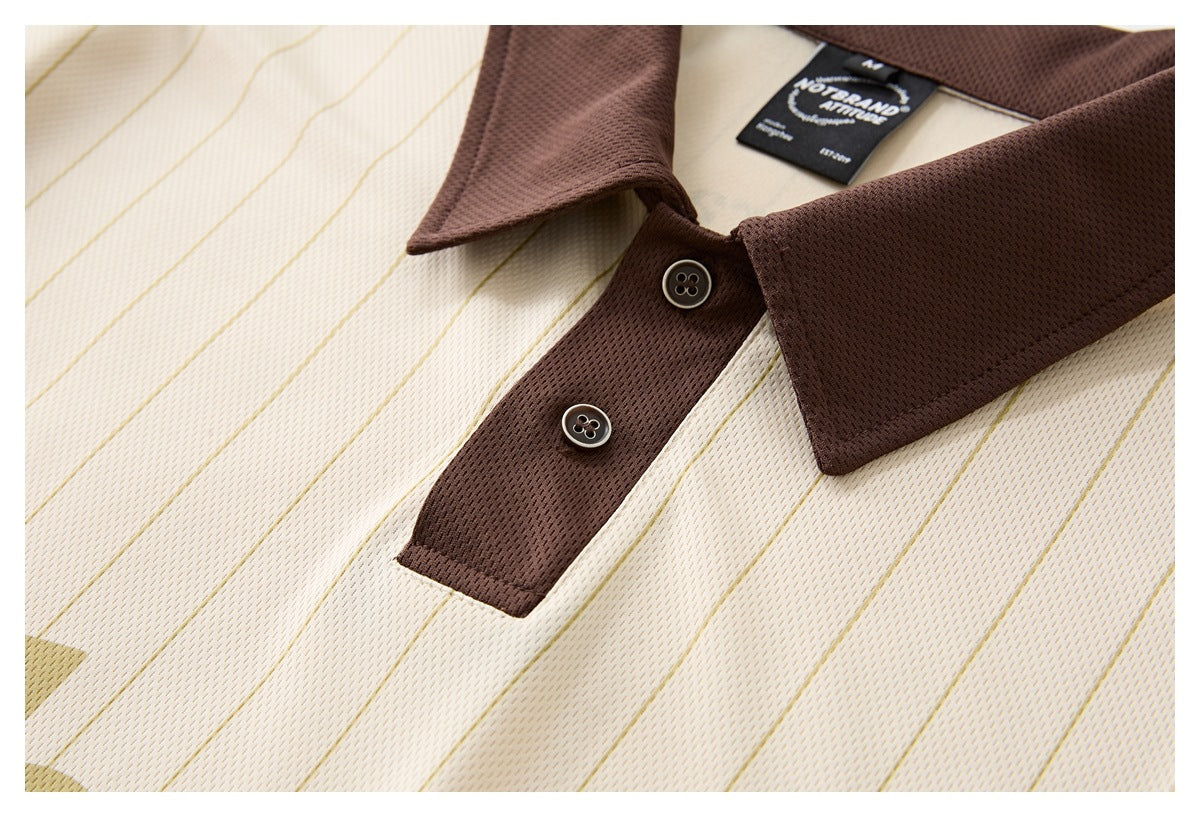 Tight close-up of the brown collar and two-button placket on a cream pinstriped polo shirt.