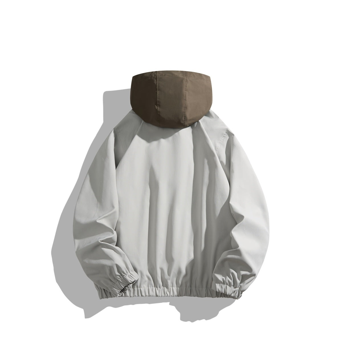 Back view of light gray hooded jacket with brown hood, raglan sleeves and elastic cuffs and hem