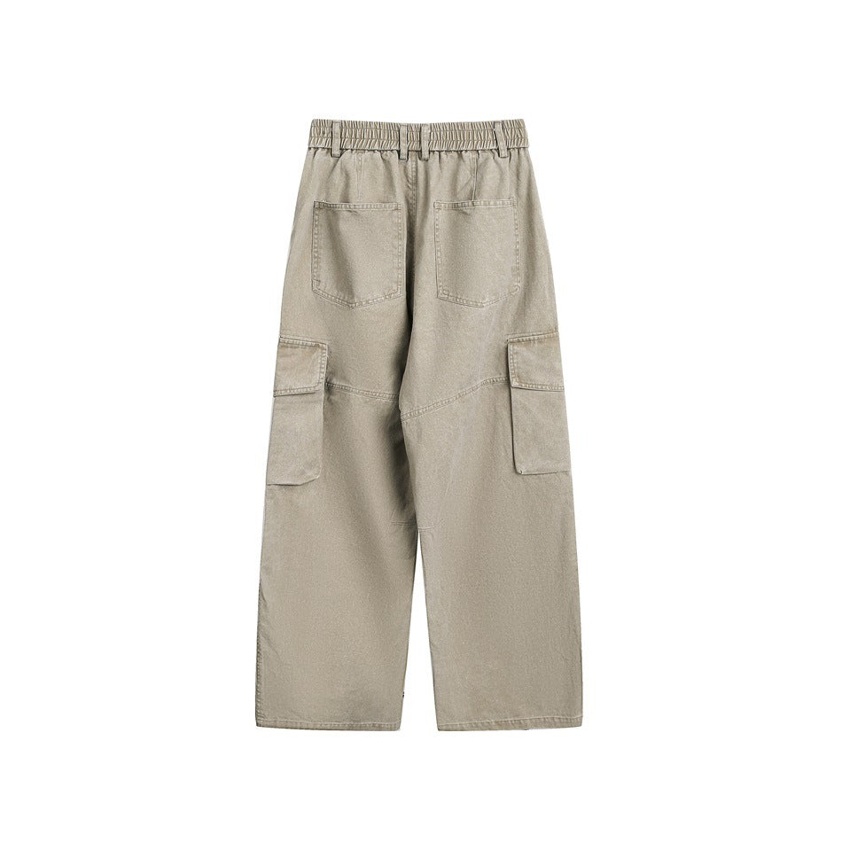 Back view of light beige wide-leg cargo pants with an elasticized waistband, two rear pockets, and side cargo pockets.