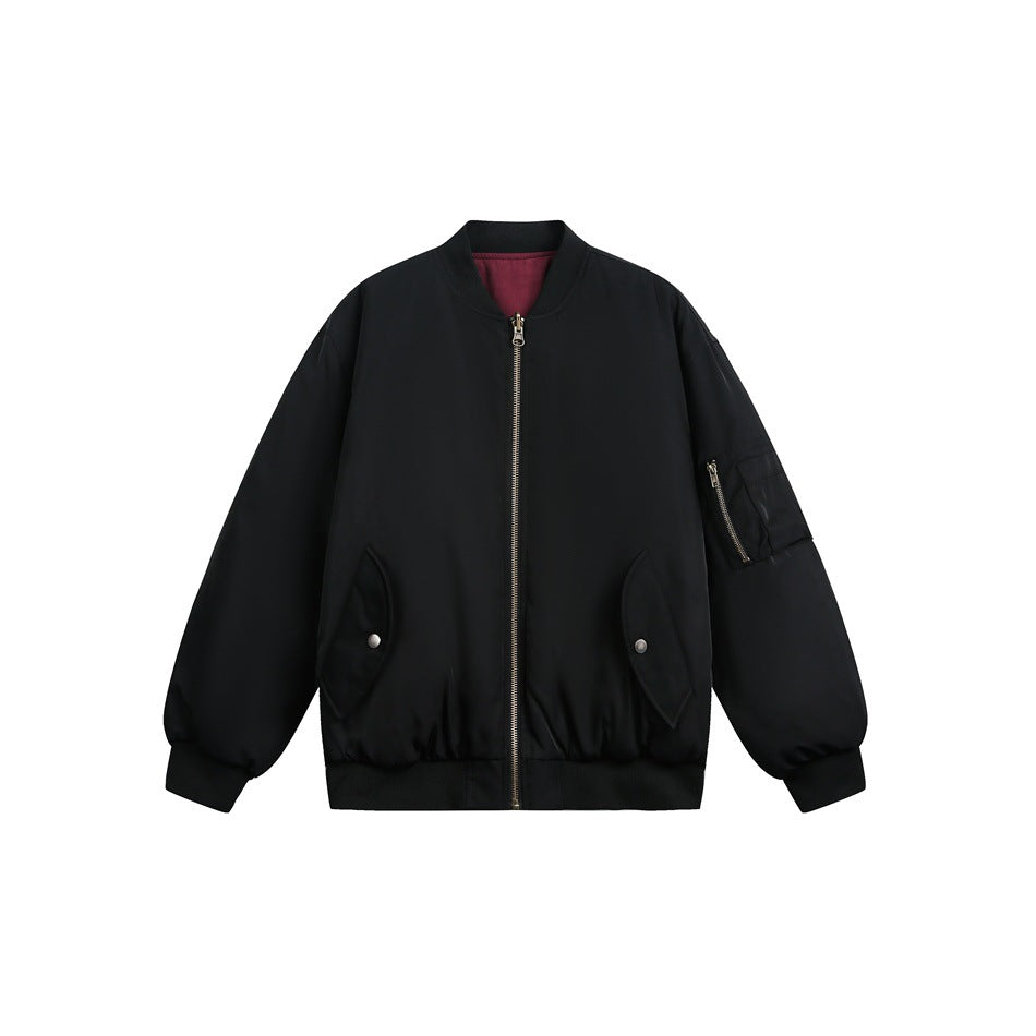 Front view of a black bomber jacket with a zip closure, snap pockets, sleeve zip pocket, and burgundy lining.