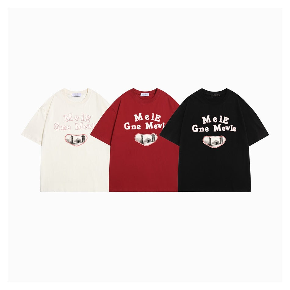 Three short-sleeve graphic T-shirts in ivory, red, and black, shown from the front.