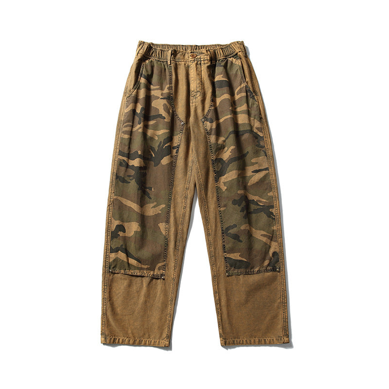 Withered leaf yellow wide-leg pants with green camouflage front leg panels and an elastic waist, flat lay