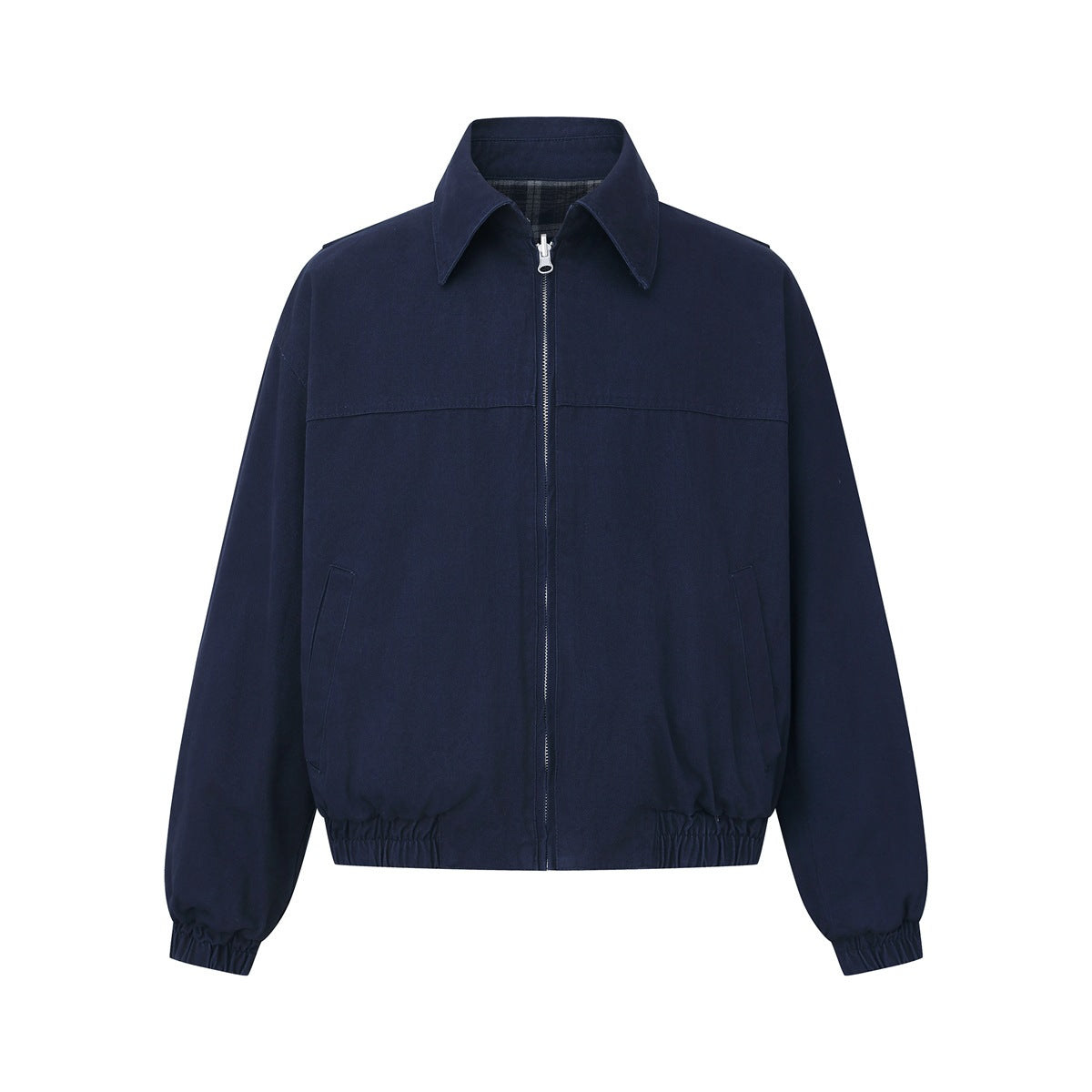 Front of navy zip-front jacket with pointed collar, yoke seam, slanted pockets and elasticated hem and cuffs