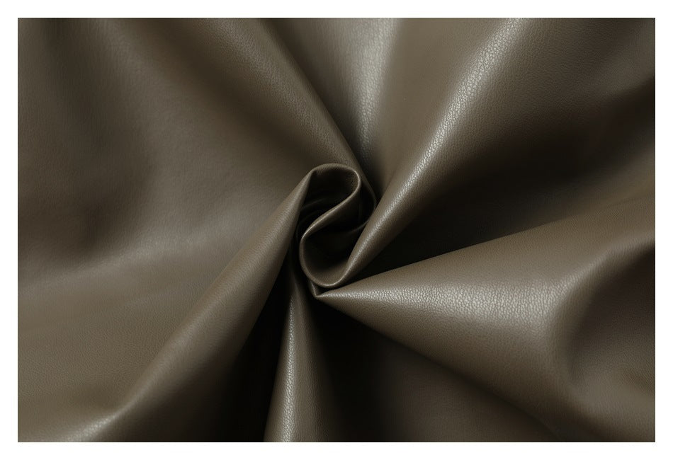 Olive-brown pebbled material gathered into a central twist.