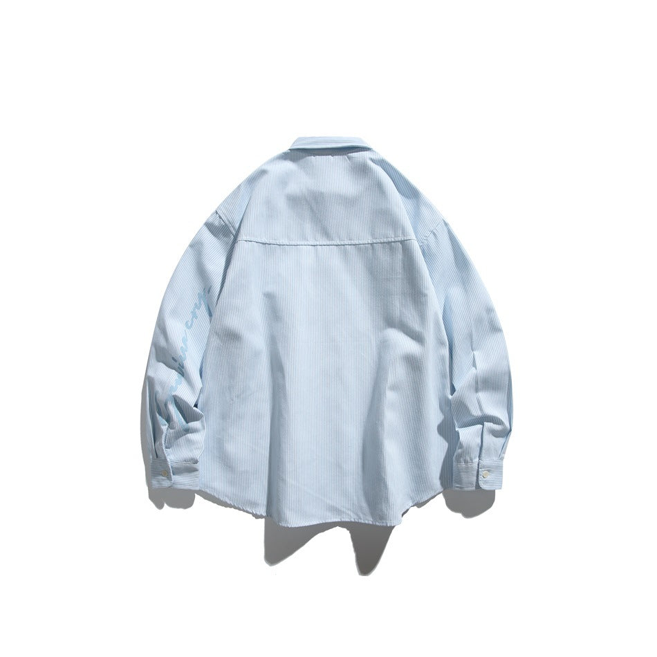 Back view of a pale blue finely striped long-sleeved button-up shirt.