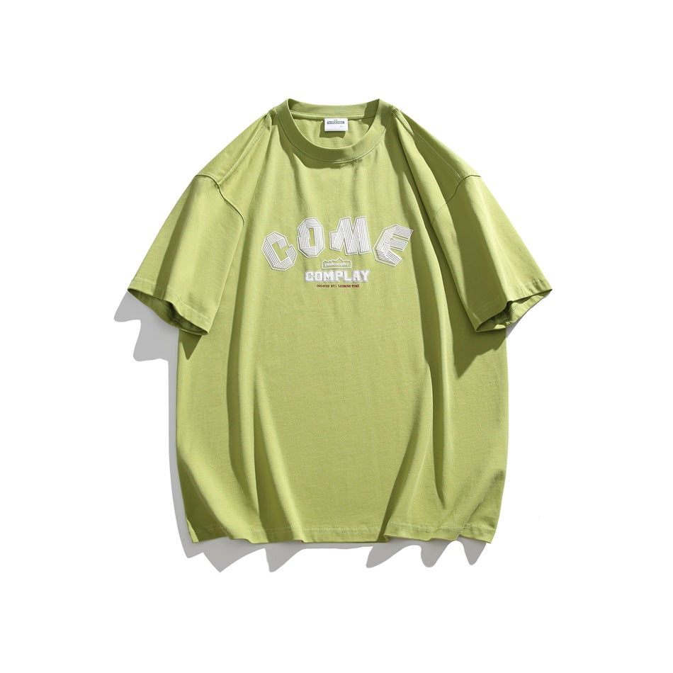 Front view of a lime-green oversized short-sleeve T-shirt with white collegiate-style lettering.