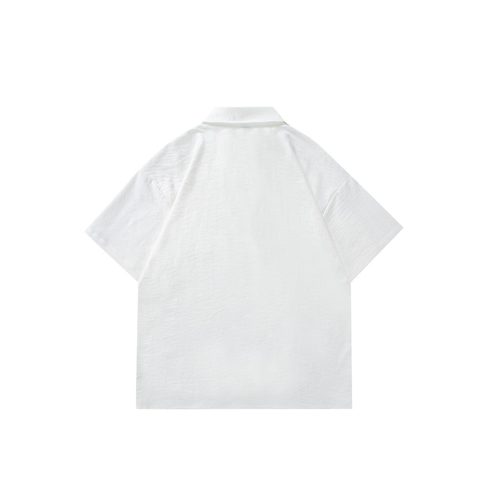 Back view of a white short-sleeve shirt with a plain textured back and a turned-down collar