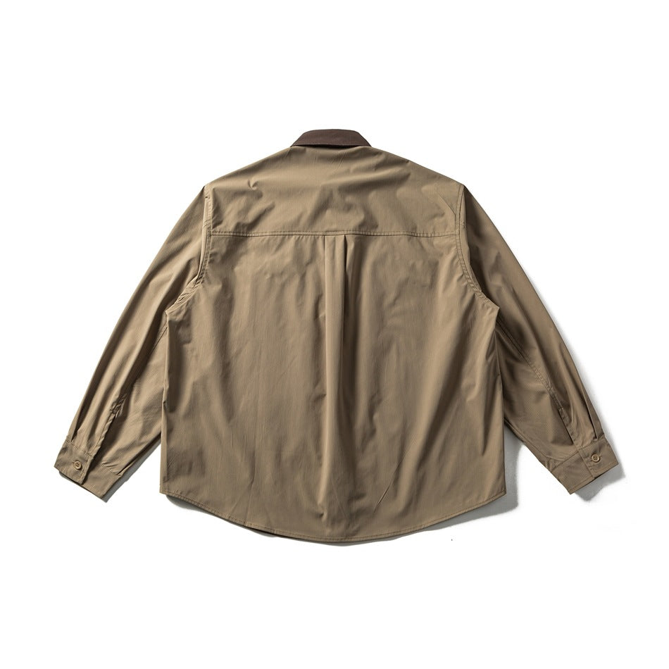 Back view of khaki long-sleeve shirt with brown collar, yoke seam, center back pleat and buttoned cuffs
