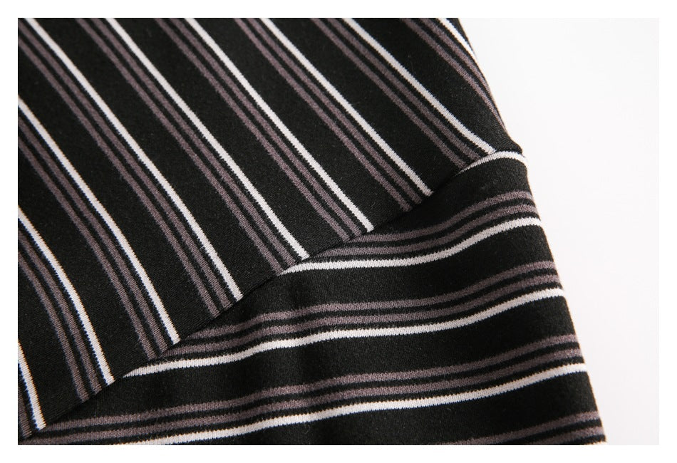 Close-up of a seam joining striped sections of the black top.