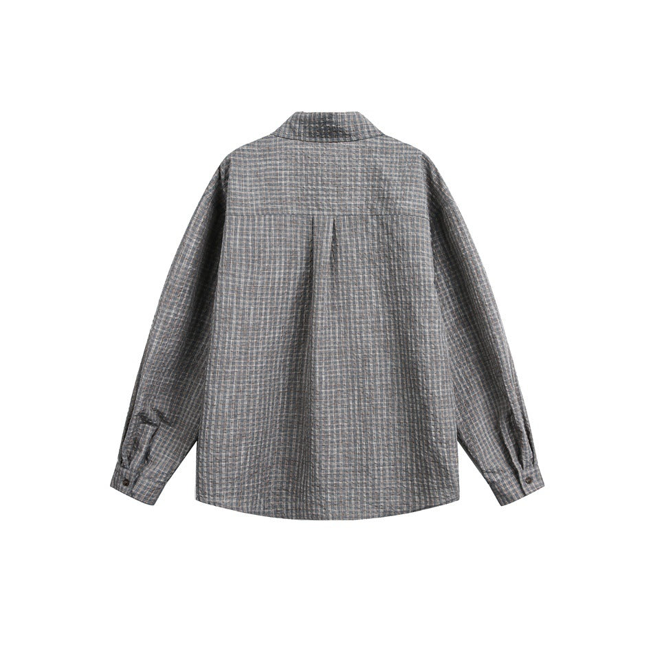 Back view of a gray-brown checked button-up shirt with long sleeves and a center back pleat.