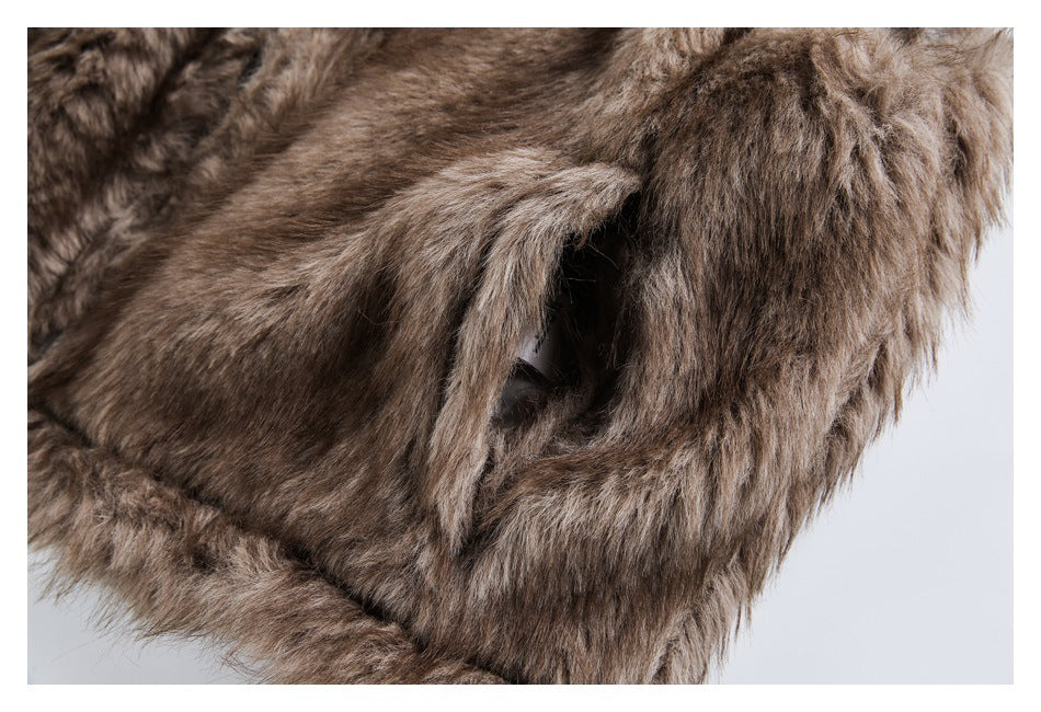 Close-up of a slit pocket opening edged in brown faux fur.