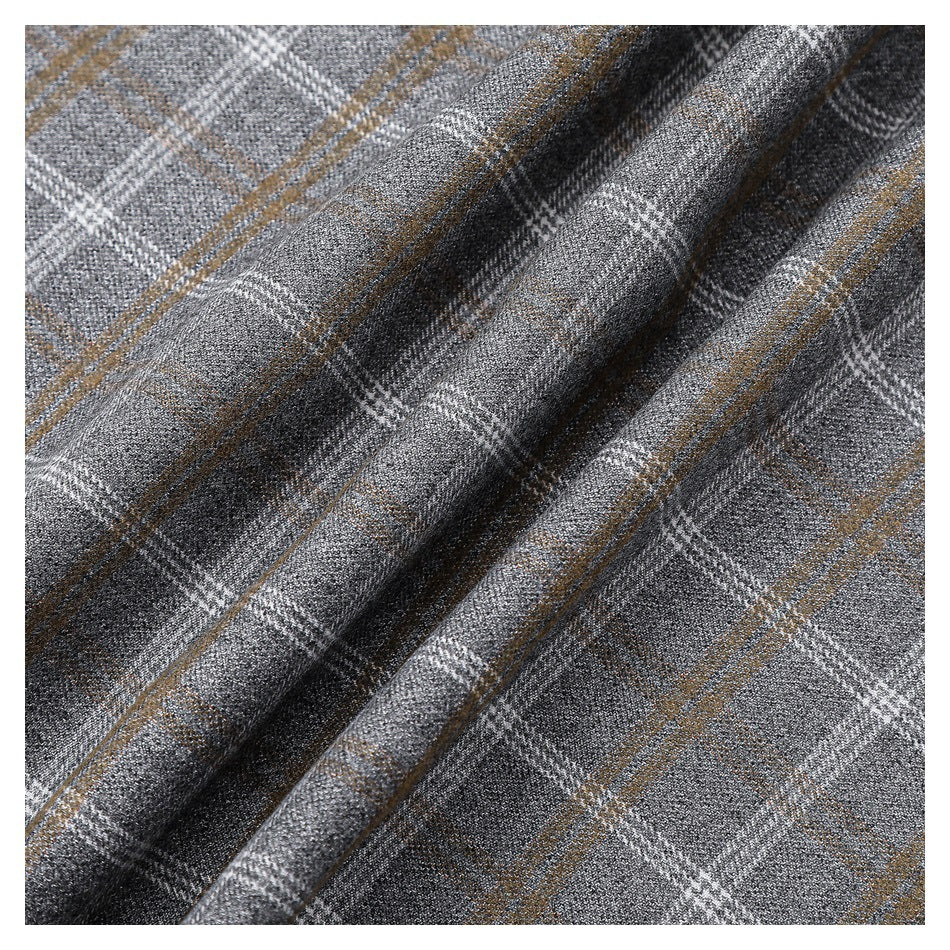 Close-up of gray plaid fabric draped into folds, with white and tan intersecting lines.