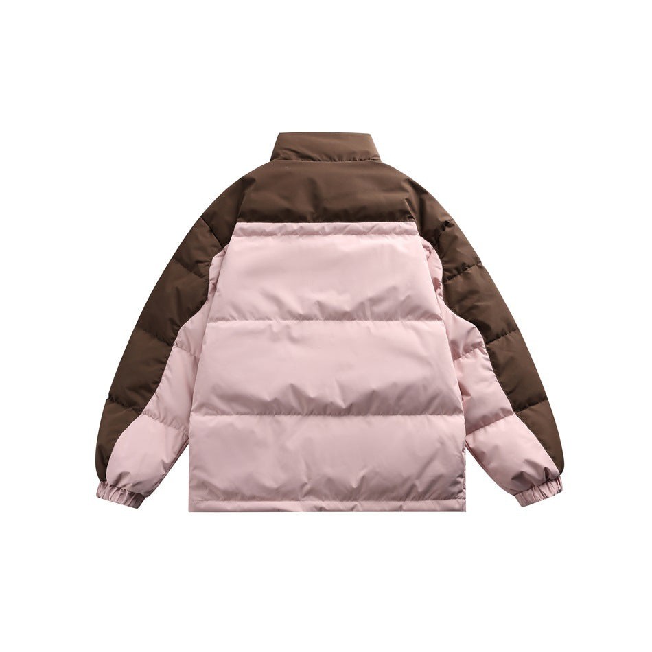 Back view of a brown and pale pink color-block puffer jacket with horizontal quilting and gathered cuffs.