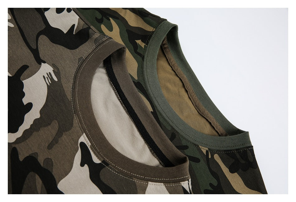 Close-up of the necklines and stitching on tan camouflage and green camouflage T-shirts.