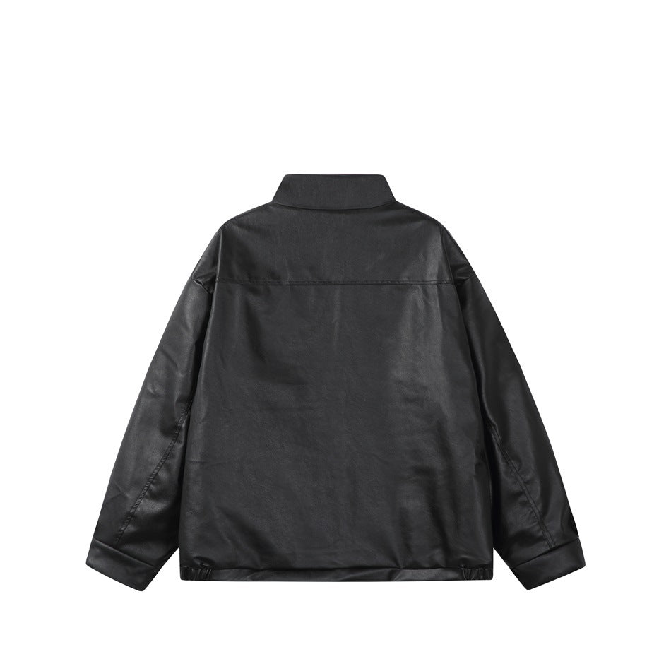 Flat back view of a black jacket with a short stand collar, long sleeves, and elasticated hem.