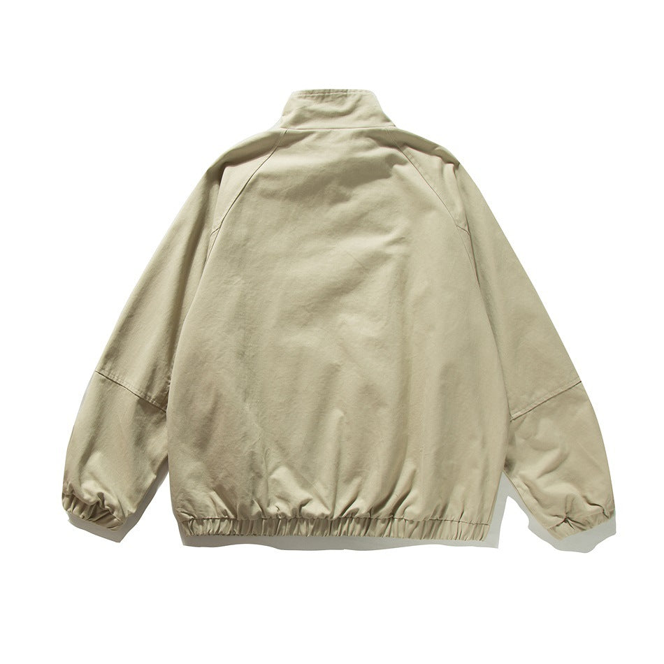 Back view of beige stand-collar jacket with raglan sleeves, elastic cuffs and elastic hem