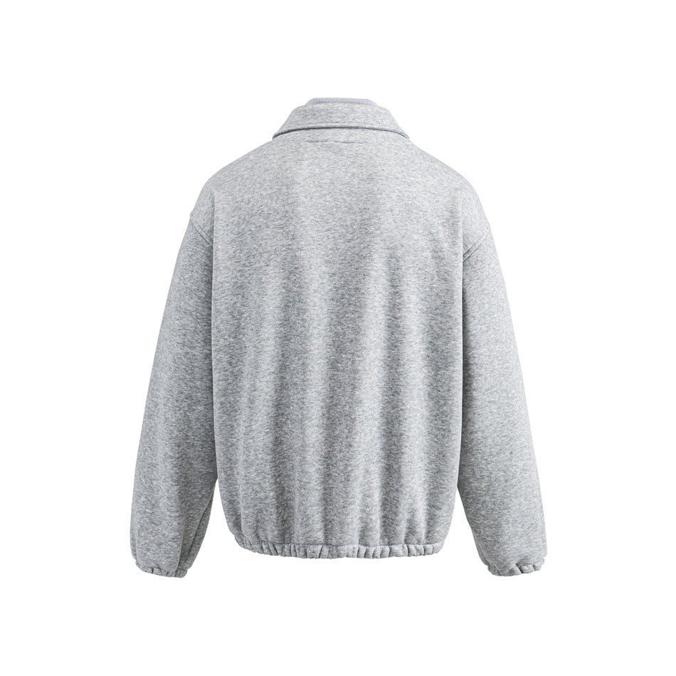 Back view of a plain heather gray pullover with long sleeves, a small collar, and gathered cuffs and hem.