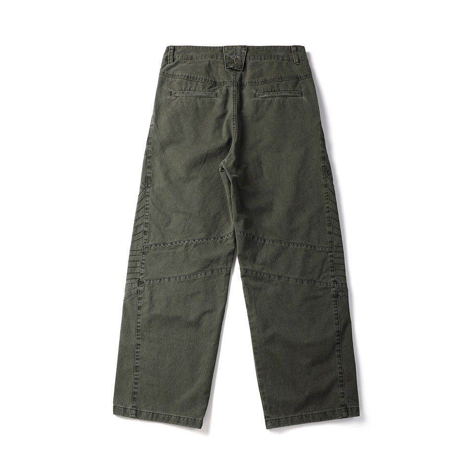 Back view of olive-gray wide-leg pants with two welt pockets and stitched panel details.