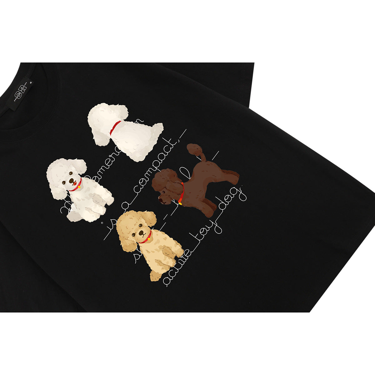 Angled close-up of a black T-shirt with colorful dog illustrations and decorative English lettering.