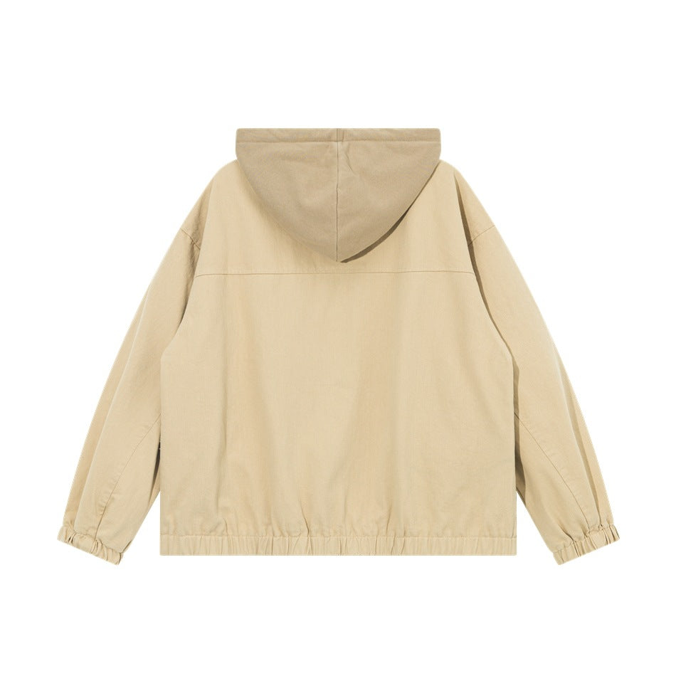 Back view of a light beige hooded jacket with a plain panel and elastic cuffs and hem.