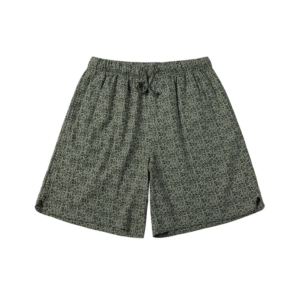 Green and cream paisley print shorts with elastic drawstring waistband, flat lay front view