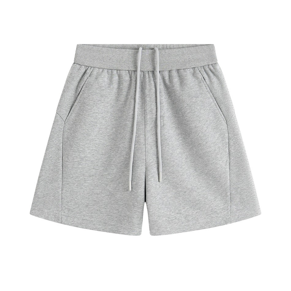 Heather gray wide-leg drawstring shorts with ribbed waistband and slanted side pockets, flat front view